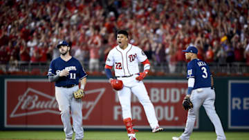 WASHINGTON, DC - OCTOBER 01: Juan Soto #22 of the Washington Nationals celebrates after hitting a single to right field to score 3 runs off of an error by Trent Grisham #2 of the Milwaukee Brewers during the eighth inning in the National League Wild Card game at Nationals Park on October 01, 2019 in Washington, DC. (Photo by Will Newton/Getty Images)