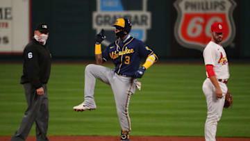 ST LOUIS, MO - SEPTEMBER 24: Orlando Arcia #3 of the Milwaukee Brewers celebrates after hitting a double against the St. Louis Cardinals as Mark Carlson #6 and Paul DeJong #11 of the St. Louis Cardinals look on in the third inning at Busch Stadium on September 24, 2020 in St Louis, Missouri. (Photo by Dilip Vishwanat/Getty Images)
