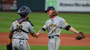 ST LOUIS, MO - SEPTEMBER 25: Omar Narvaez #10 of the Milwaukee Brewers celebrates with Josh Hader #71 of the Milwaukee Brewers after beating the St. Louis Cardinals during game one of a doubleheader at Busch Stadium on September 25, 2020 in St Louis, Missouri. (Photo by Dilip Vishwanat/Getty Images)