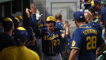 PITTSBURGH, PA - AUGUST 02: Willy Adames #27 of the Milwaukee Brewers celebrates with teammates in the dugout after hitting a solo home run in the sixth inning during the game against the Pittsburgh Pirates at PNC Park on August 2, 2022 in Pittsburgh, Pennsylvania. (Photo by Justin Berl/Getty Images)
