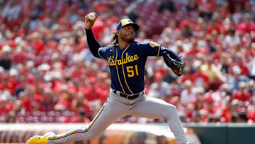 CINCINNATI, OH - SEPTEMBER 25: Freddy Peralta #51 of the Milwaukee Brewers throws a pitch during the second inning of the game against the Cincinnati Reds at Great American Ball Park on September 25, 2022 in Cincinnati, Ohio. (Photo by Kirk Irwin/Getty Images)