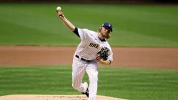 MILWAUKEE, WISCONSIN - AUGUST 28: Corbin Burnes #42 of the Milwaukee Brewers pitches in the first inning against the Pittsburgh Pirates at Miller Park on August 28, 2020 in Milwaukee, Wisconsin. All players are wearing #42 in honor of Jackie Robinson Day. The day honoring Jackie Robinson, traditionally held on April 15, was rescheduled due to the COVID-19 pandemic. (Photo by Dylan Buell/Getty Images)
