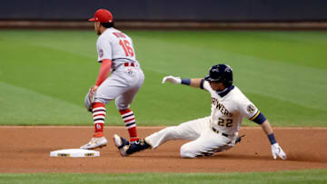 MILWAUKEE, WISCONSIN - SEPTEMBER 14: Christian Yelich #22 of the Milwaukee Brewers slides into second base for a double past Kolten Wong #16 of the St. Louis Cardinals in the first inning during game one of a doubleheader at Miller Park on September 14, 2020 in Milwaukee, Wisconsin. (Photo by Dylan Buell/Getty Images)