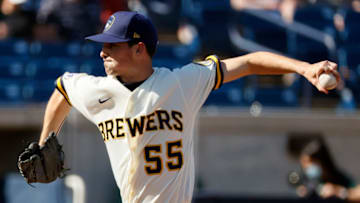 PHOENIX, ARIZONA - MARCH 02: Hoby Milner #55 of the Milwaukee Brewers pitches against the Oakland Athletics in the fourth inning during the MLB spring training game on March 02, 2021 at American Family Fields of Phoenix in Phoenix, Arizona. (Photo by Steph Chambers/Getty Images)