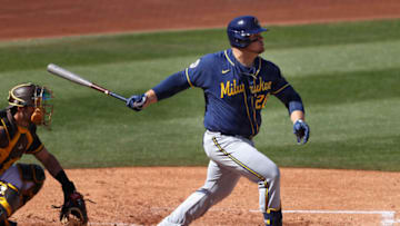 PEORIA, ARIZONA - MARCH 03: Daniel Vogelbach #20 of the Milwaukee Brewers bats against the San Diego Padres during the third inning of the MLB spring training game on March 03, 2021 in Peoria, Arizona. (Photo by Christian Petersen/Getty Images)