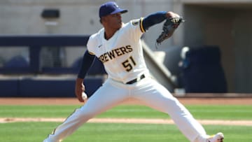 PHOENIX, ARIZONA - MARCH 21: Freddy Peralta #51 of the Milwaukee Brewers pitches in the second inning against the Seattle Mariners during the MLB spring training game at American Family Fields of Phoenix on March 21, 2021 in Phoenix, Arizona. (Photo by Abbie Parr/Getty Images)