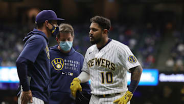 MILWAUKEE, WISCONSIN - APRIL 30: Omar Narvaez #10 of the Milwaukee Brewers speaks with manager Craig Counsell #30 during the sixth inning against the Los Angeles Dodgers at American Family Field on April 30, 2021 in Milwaukee, Wisconsin. (Photo by Stacy Revere/Getty Images)