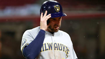 CINCINNATI, OHIO - JUNE 08: Travis Shaw #21 of the Milwaukee Brewers walks across the field in the ninth inning against the Cincinnati Reds at Great American Ball Park on June 08, 2021 in Cincinnati, Ohio. (Photo by Dylan Buell/Getty Images)