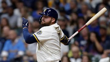 MILWAUKEE, WISCONSIN - AUGUST 24: Rowdy Tellez #11 of the Milwaukee Brewers up to bat against the Cincinnati Reds at American Family Field on August 24, 2021 in Milwaukee, Wisconsin. Brewers defeated the Reds 7-4. (Photo by John Fisher/Getty Images)