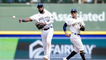 MILWAUKEE, WISCONSIN - SEPTEMBER 05: Pablo Reyes #33 of the Milwaukee Brewers throws out a runner against the St. Louis Cardinals at American Family Field on September 05, 2021 in Milwaukee, Wisconsin. Brewers defeated the Cardinals 6-5. (Photo by John Fisher/Getty Images)