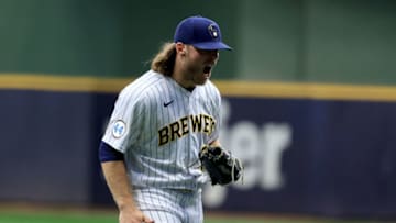 MILWAUKEE, WISCONSIN - SEPTEMBER 18: Corbin Burnes #39 of the Milwaukee Brewers walks off the field in the game against the Chicago Cubs at American Family Field on September 18, 2021 in Milwaukee, Wisconsin. (Photo by Justin Casterline/Getty Images)