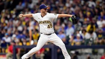 MILWAUKEE, WISCONSIN - OCTOBER 09: Brad Boxberger #45 of the Milwaukee Brewers pitches in the ninth during game 2 of the National League Division Series against the Atlanta Braves at American Family Field on October 09, 2021 in Milwaukee, Wisconsin. (Photo by Patrick McDermott/Getty Images)