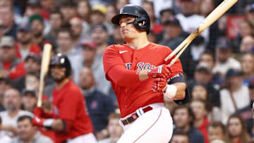 BOSTON, MASSACHUSETTS - OCTOBER 10: Hunter Renfroe #10 of the Boston Red Sox breaks hit bat on a single in the fourth inning against the Tampa Bay Rays during Game 3 of the American League Division Series at Fenway Park on October 10, 2021 in Boston, Massachusetts. (Photo by Winslow Townson/Getty Images)