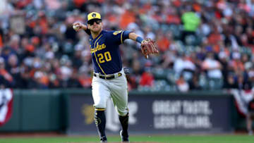 BALTIMORE, MARYLAND - APRIL 11: Mike Brosseau #20 of the Milwaukee Brewers throws to first base against the Baltimore Orioles during Opening Day at Oriole Park at Camden Yards on April 11, 2022 in Baltimore, Maryland. (Photo by Rob Carr/Getty Images)
