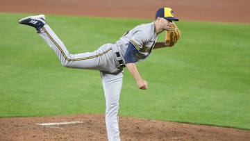 BALTIMORE, MARYLAND - APRIL 12: Jake Cousins #54 of the Milwaukee Brewers pitches during a baseball game against the Baltimore Orioles at the Orioles Park at Camden Yards on April 12, 2022 in Baltimore, Maryland. (Photo by Mitchell Layton/Getty Images)