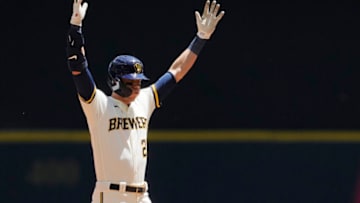 MILWAUKEE, WISCONSIN - JUNE 23: Christian Yelich #22 of the Milwaukee Brewers reacts after hitting a double against the St. Louis Cardinals in the first inning at American Family Field on June 23, 2022 in Milwaukee, Wisconsin. (Photo by Patrick McDermott/Getty Images)