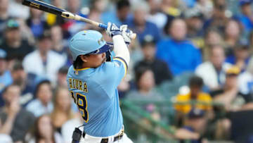 MILWAUKEE, WISCONSIN - JULY 08: Keston Hiura #18 of the Milwaukee Brewers hits an RBI single against the Pittsburgh Pirates in the second inning at American Family Field on July 08, 2022 in Milwaukee, Wisconsin. (Photo by Patrick McDermott/Getty Images)