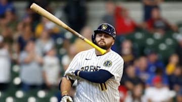 MILWAUKEE, WISCONSIN - OCTOBER 02: Rowdy Tellez #11 of the Milwaukee Brewers throws his bat after making an out against the Miami Marlins at American Family Field on October 02, 2022 in Milwaukee, Wisconsin. (Photo by John Fisher/Getty Images)