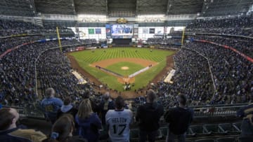 MILWAUKEE, WI - APRIL 1: General view of the Colorado Rockies and Milwaukee Brewers line the base lines during the National Anthem on opening day at Miller Park on April 1, 2013 in Milwaukee, Wisconsin. (Photo by Tom Lynn/Getty Images)