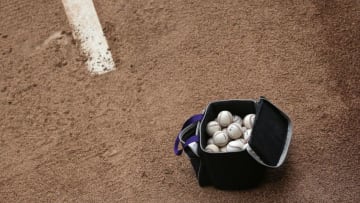 DENVER, CO - APRIL 25: A bag of baseballs sits on the mound in the bullpen as the Pittsburgh Pirates prepare to face the Colorado Rockies at Coors Field on April 25, 2016 in Denver, Colorado. (Photo by Doug Pensinger/Getty Images)