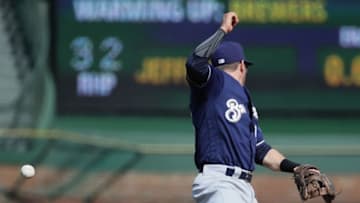 CHICAGO, IL - APRIL 27: Eric Sogard #18 of the Milwaukee Brewers looses the ball in the 7th inning against the Chicago Cubs at Wrigley Field on April 27, 2018 in Chicago, Illinois. (Photo by Jonathan Daniel/Getty Images)