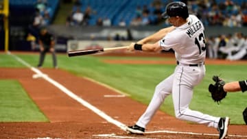 ST PETERSBURG, FL - MAY 27: Brad Miller #13 of the Tampa Bay Rays hits a home run in the first inning against the Baltimore Orioles on May 27, 2018 at Tropicana Field in St Petersburg, Florida. (Photo by Julio Aguilar/Getty Images)