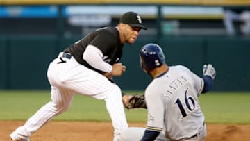 CHICAGO, IL - JUNE 01: Domingo Santana #16 of the Milwaukee Brewers slides into second base for a double past Yoan Moncada #10 of the Chicago White Sox in the third inning at Guaranteed Rate Field on June 1, 2018 in Chicago, Illinois. (Photo by Dylan Buell/Getty Images)