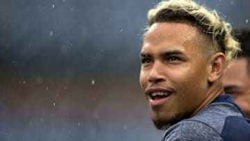 PHILADELPHIA, PA - JUNE 10: Orlando Arcia #3 of the Milwaukee Brewers watches the game against the Philadelphia Phillies in the rain from the dugout at Citizens Bank Park on June 10, 2018 in Philadelphia, Pennsylvania. (Photo by Mitchell Leff/Getty Images)