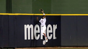 MILWAUKEE, WI - JULY 02: Keon Broxton #23 of the Milwaukee Brewers leaps to catch a fly ball in the seventh inning against the Minnesota Twins at Miller Park on July 2, 2018 in Milwaukee, Wisconsin. (Photo by Dylan Buell/Getty Images)
