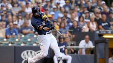 MILWAUKEE, WI - JULY 05: Jonathan Villar #5 of the Milwaukee Brewers hits a double in the first inning against the Atlanta Braves at Miller Park on July 5, 2018 in Milwaukee, Wisconsin. (Photo by Dylan Buell/Getty Images)