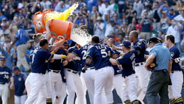 MILWAUKEE, WI - SEPTEMBER 23: The Milwaukee Brewers celebrate after Travis Shaw