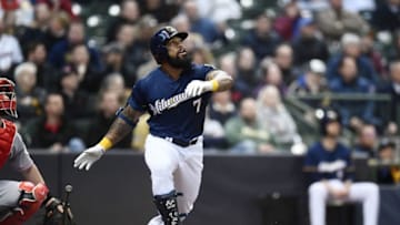 MILWAUKEE, WI - APRIL 18: Eric Thames #7 of the Milwaukee Brewers hits a two run home run against the Cincinnati Reds during the third inning of a game at Miller Park on April 18, 2018 in Milwaukee, Wisconsin. (Photo by Stacy Revere/Getty Images)