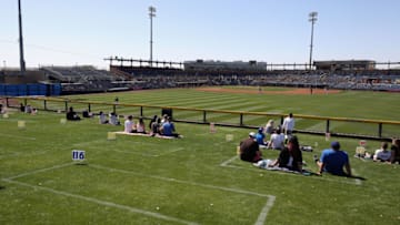 PEORIA, ARIZONA - MARCH 03: Socially-distant fans watch from the outfield during the first inning of the MLB spring training game between the San Diego Padres and the Milwaukee Brewers on March 03, 2021 in Peoria, Arizona. (Photo by Christian Petersen/Getty Images)
