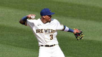 PHOENIX, ARIZONA - MARCH 04: Orlando Arcia #3 of the the Milwaukee Brewers throws the ball to second base against the Cleveland Indians during a spring training game at American Family Fields of Phoenix on March 04, 2021 in Phoenix, Arizona. (Photo by Norm Hall/Getty Images)