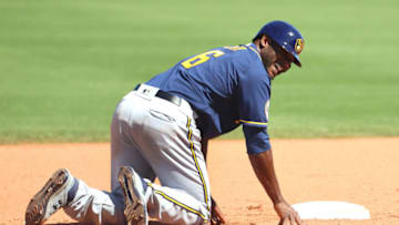 SURPRISE, ARIZONA - MARCH 27: Lorenzo Cain #6 of the Milwaukee Brewers smiles after safely reaching second base in the fifth inning against the Kansas City Royals during the MLB spring training game at Surprise Stadium on March 27, 2021 in Surprise, Arizona. (Photo by Abbie Parr/Getty Images)