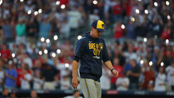 ATLANTA, GEORGIA - OCTOBER 12: Craig Counsell #30 of the Milwaukee Brewers walks back to the dugout during the fourth inning against the Atlanta Braves in game four of the National League Division Series at Truist Park on October 12, 2021 in Atlanta, Georgia. (Photo by Kevin C. Cox/Getty Images)
