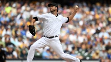 MILWAUKEE, WISCONSIN - AUGUST 25: Drew Pomeranz #15 of the Milwaukee Brewers throws a pitch during the seventh inning against the Arizona Diamondbacks at Miller Park on August 25, 2019 in Milwaukee, Wisconsin. Teams are wearing special color schemed uniforms with players choosing nicknames to display for Players Weekend. (Photo by Stacy Revere/Getty Images)