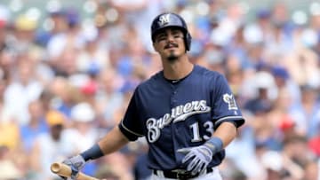 MILWAUKEE, WISCONSIN - JULY 28: Tyler Saladino #13 of the Milwaukee Brewers reacts after striking out in the fifth inning against the Chicago Cubs at Miller Park on July 28, 2019 in Milwaukee, Wisconsin. (Photo by Dylan Buell/Getty Images)