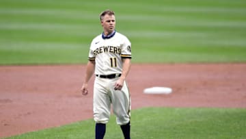 MILWAUKEE, WISCONSIN - JULY 14: Brock Holt #11 of the Milwaukee Brewers walks to the dugout during Summer Workouts at Miller Park on July 14, 2020 in Milwaukee, Wisconsin. (Photo by Stacy Revere/Getty Images)
