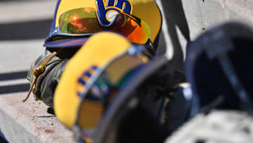Mar 4, 2018; Phoenix, AZ, USA; A Milwaukee Brewers cap sits in the dugout during the second inning of the game against the Cleveland Indians at Maryvale Baseball Park. Mandatory Credit: Joe Camporeale-USA TODAY Sports