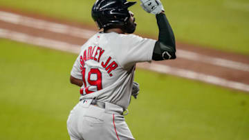 Sep 25, 2020; Cumberland, Georgia, USA; Boston Red Sox center fielder Jackie Bradley Jr. (19) reacts after hitting a home run against the Atlanta Braves during the fifth inning at Truist Park. Mandatory Credit: Dale Zanine-USA TODAY Sports