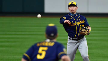 Sep 26, 2020; St. Louis, Missouri, USA; Milwaukee Brewers second baseman Keston Hiura (18) throws to first baseman Jedd Gyorko (5) during the fifth inning against the St. Louis Cardinals at Busch Stadium. Mandatory Credit: Jeff Curry-USA TODAY Sports