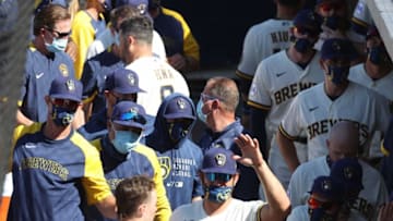 Milwaukee Brewers non-roster invitee Brice Turang (72) is met by the Brewers bench after hitting a home run during their spring training game against the Los Angeles Angels, Monday, March 8, 2021, in Phoenix.(Photo/Roy Dabner) ORG XMIT: RDX041Brice Turang