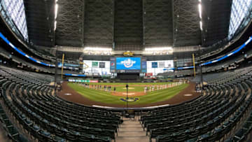 2020: The Milwaukee Brewers and Chicago White Sox line up for the first game of the pandemic-plague season at Miller Park on Aug. 3, 2020. For the first time, opening day took place with no fans in the stands.Brewers 2020 Home Opener