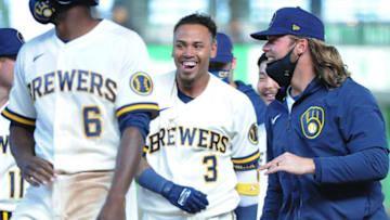 Apr 1, 2021; Milwaukee, Wisconsin, USA; Milwaukee Brewers shortstop Orlando Arcia (3) smiles after hitting the game winning hit in a 6-5 win over the Minnesota Twins after ten innings at American Family Field. Mandatory Credit: Michael McLoone-USA TODAY Sports