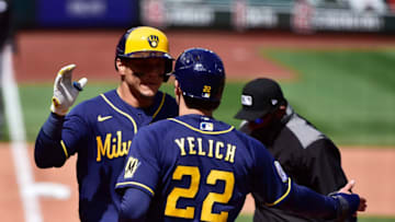 Apr 10, 2021; St. Louis, Missouri, USA; Milwaukee Brewers right fielder Avisail Garcia (24) is congratulated by left fielder Christian Yelich (22) after hitting a two run home run off of St. Louis Cardinals starting pitcher Carlos Martinez (not pictured) during the fifth inning at Busch Stadium. Mandatory Credit: Jeff Curry-USA TODAY Sports