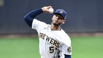 Apr 18, 2021; Milwaukee, Wisconsin, USA; Milwaukee Brewers pitcher Freddy Peralta (51) throws a pitch in the first inning against the Pittsburgh Pirates at American Family Field. Mandatory Credit: Benny Sieu-USA TODAY Sports