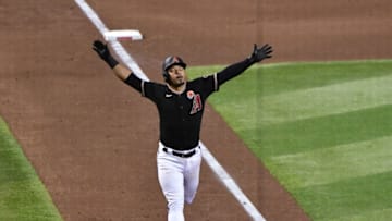 May 31, 2021; Phoenix, Arizona, USA; Arizona Diamondbacks third baseman Eduardo Escobar (5) celebrates after hitting a solo home run in the seventh inning against the New York Mets at Chase Field. Mandatory Credit: Matt Kartozian-USA TODAY Sports