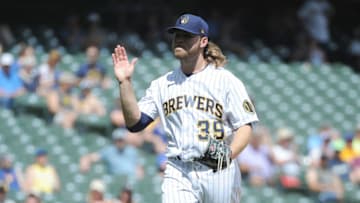 Jun 6, 2021; Milwaukee, Wisconsin, USA; Milwaukee Brewers starting pitcher Corbin Burnes (39) celebrates getting retiring the side with two men on base for the Arizona Diamondbacks in the fifth inning at American Family Field. Mandatory Credit: Michael McLoone-USA TODAY Sports