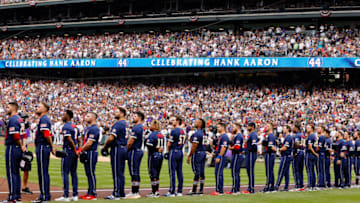 Jul 13, 2021; Denver, Colorado, USA; The American League and National League players and fans stand as they honor the late Hank Aaron before the 2021 MLB All Star Game at Coors Field. Mandatory Credit: Isaiah J. Downing-USA TODAY Sports